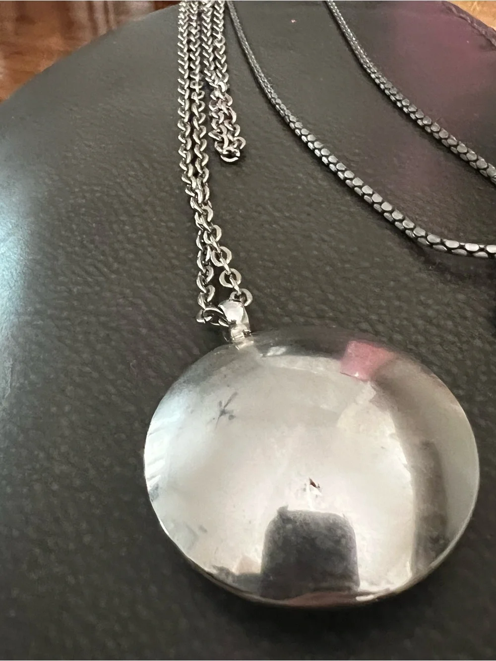 Silver tone Turtle Pendant Necklace with Red and Pink Accent Stones.